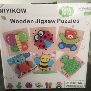 Brand New Wooden Puzzles. Set of 6, still in box.